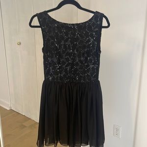 Backless black dress with sequins